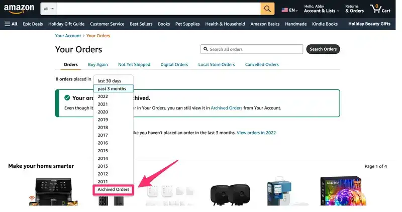Amazon “Your Orders” page with the order filter dropdown open, showing year options and the Archived Orders option highlighted by a red arrow, indicating how to view archived Amazon orders.