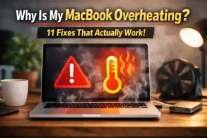 MacBook overheating with warning icons on screen and visible heat effects